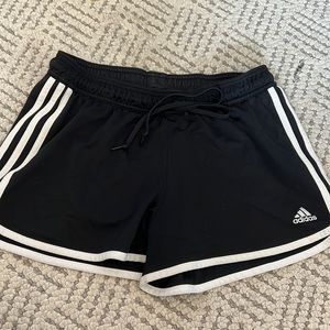 Small black adidas super cute! I’m great condition.
